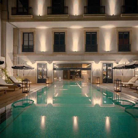Ga Palace Hotel & Spa, A Xixth-Century Villa 포르투 외부 사진 The pool at the hotel