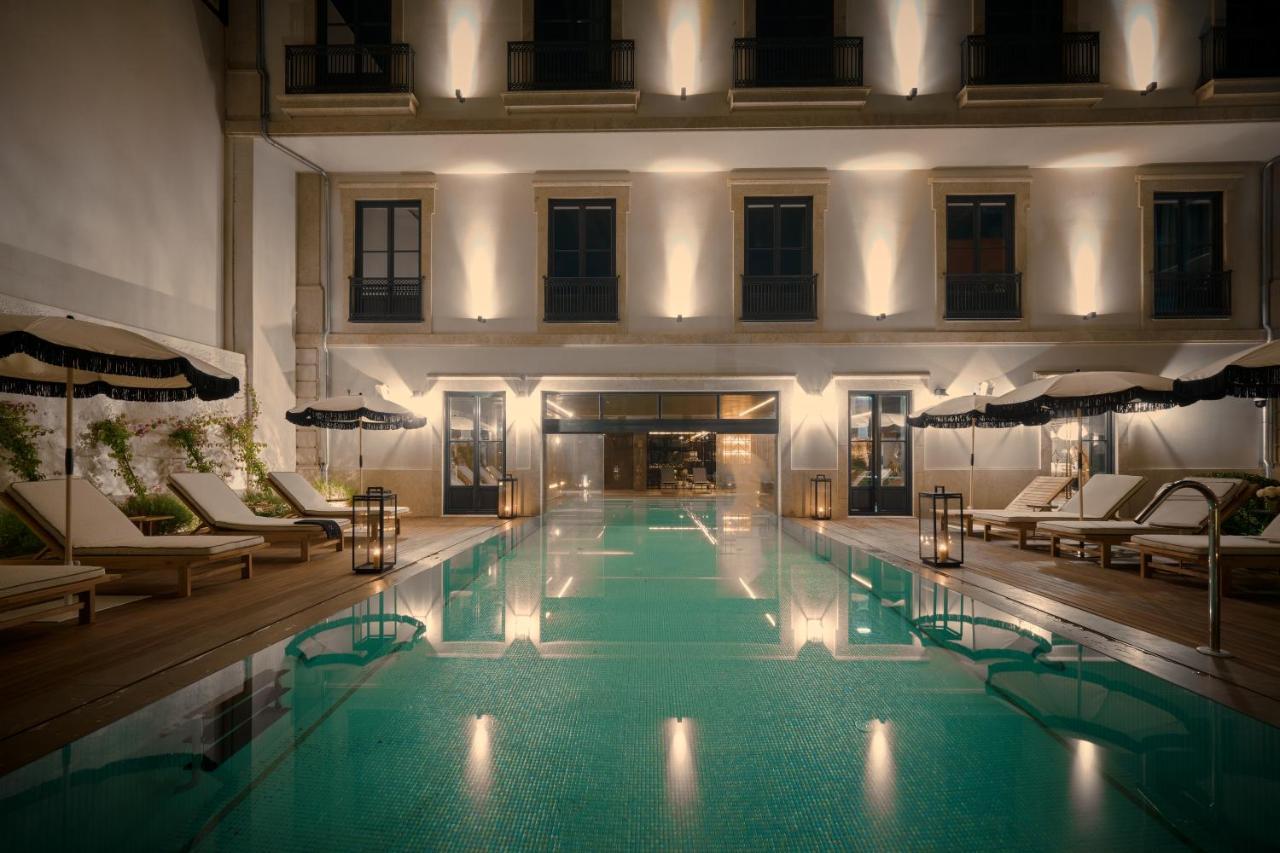 Ga Palace Hotel & Spa, A Xixth-Century Villa 포르투 외부 사진 The pool at the hotel
